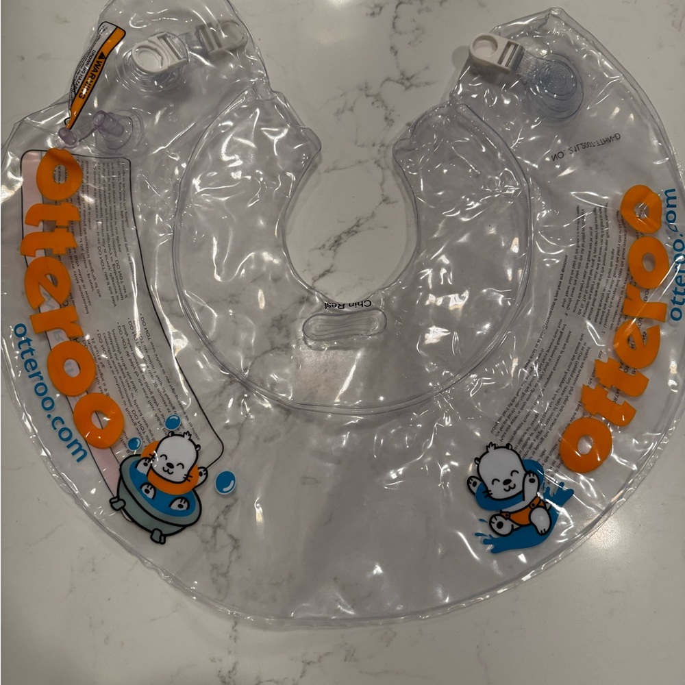 Otteroo Clear Baby Neck Float with Orange Accents